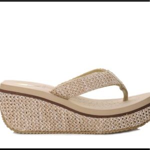 Volatile wedge sandal